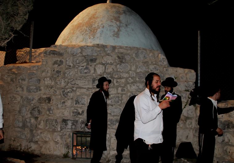 Outside the tomb of Calev Ben Yepune in the Palestinian village of Kifl Haris (credit: TOVAH LAZAROFF)