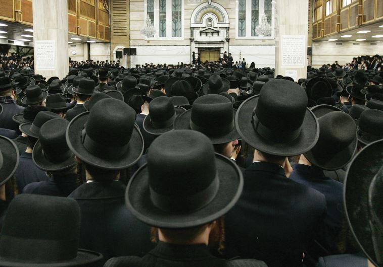 Satmar Hasidim in the Yetev Lev D’Satmar synagogue in the town of Kiryas Joel, New York (credit: REUTERS)