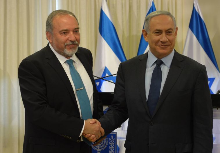 Netanyahu and Liberman (credit: AMOS BEN GERSHOM, GPO)