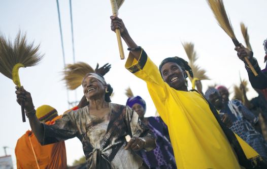 Members of the Black Hebrews dance as they take part in celebrations for Shavuot in Dimona (credit: REUTERS)