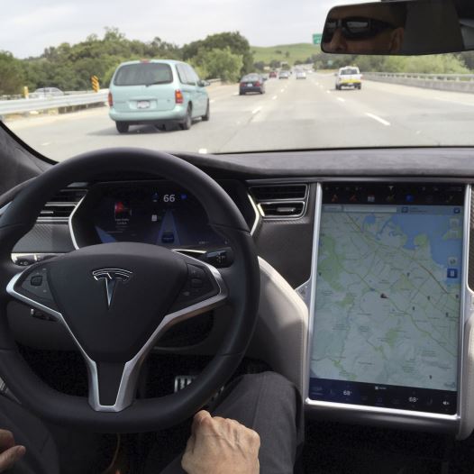 The interior of a Tesla Model S is shown in autopilot mode in San Francisco, California, U.S., April 7, 2016.