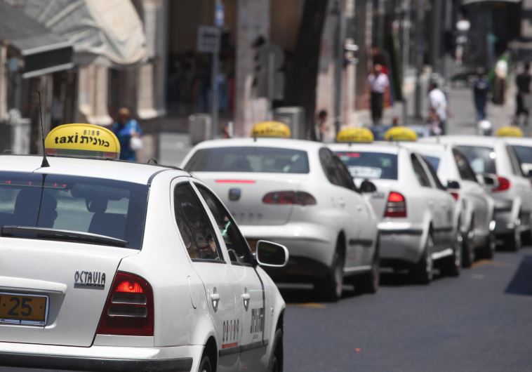 Taxis on Jerusalem's King George Street (credit: MARC ISRAEL SELLEM/THE JERUSALEM POST)