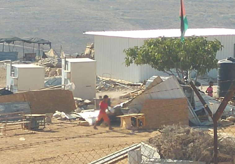 Demolition of illegal structures built by Arabs in the West Bank's Area C, August 9, 2016 (credit: MOUNT HEBRON REGIONAL COUNCIL SPOKESPERSON'S OFFICE)