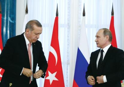 Russian President Vladimir Putin (right) and Turkish President Tayyip Erdogan attend a news conference following their meeting in St. Petersburg on August 9 (photo credit: REUTERS)