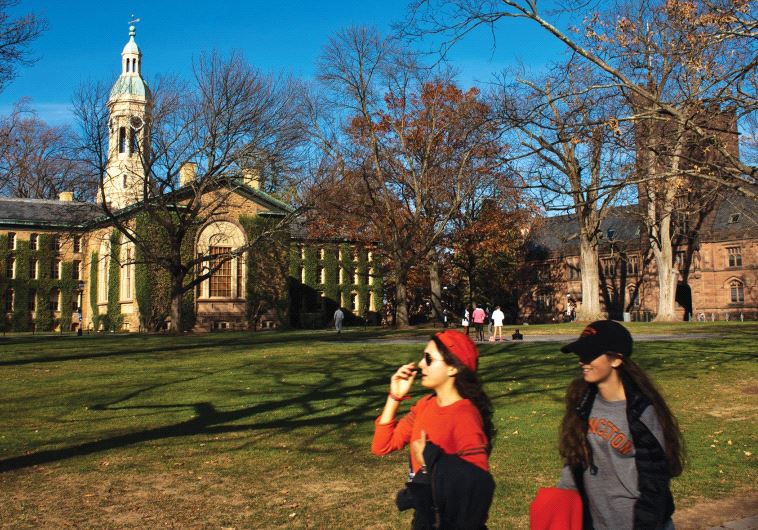 STUDENTS WALK around the Princeton University campus in New Jersey.