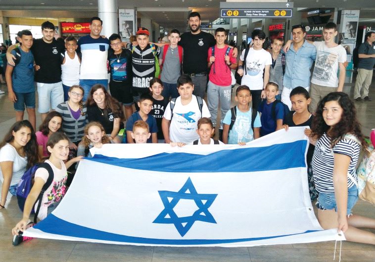 The group preparing to depart from Ben-Gurion International Airport (credit: IDF WIDOWS AND ORPHANS ORGANIZATION)