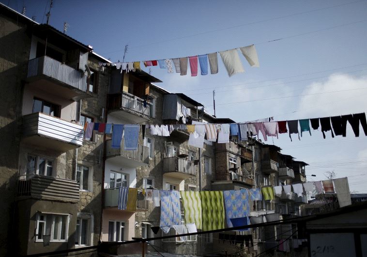 Laundry hung out to dry. (credit: REUTERS)