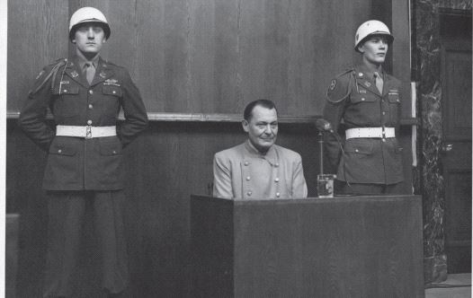Hermann Goering, pictured at the 1945 Nuremberg Trials, was described by an American warden as a &lsquo;simpering slob&rsquo;