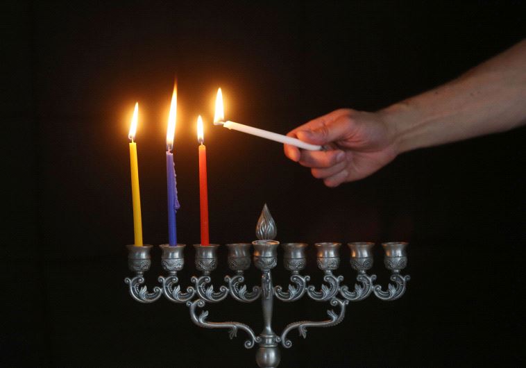 Lighting of the Hanukkah menorah  (credit: MARC ISRAEL SELLEM/THE JERUSALEM POST)