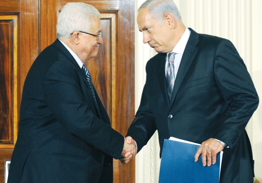 PM Netanyahu and President of the Palestinian Authority Mahmoud Abbas in Washington, 2010 (credit: GPO)