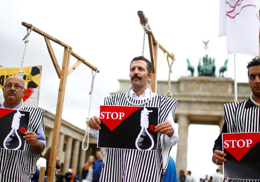 People stage a protest against the execution by Iran of up to 20 Kurds. (credit: REUTERS)