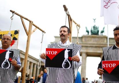 People stage a protest against the execution by Iran of up to 20 Kurds. (photo credit: REUTERS)