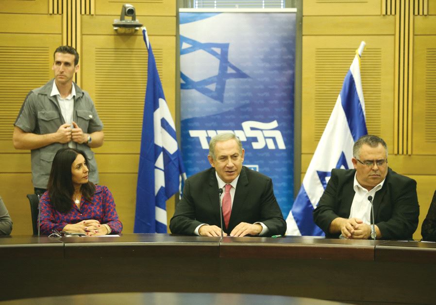 Culture Minister Miri Regev, Prime Minister Netanyahu and MK David Bitan in the Knesset in November (credit: MARC ISRAEL SELLEM)