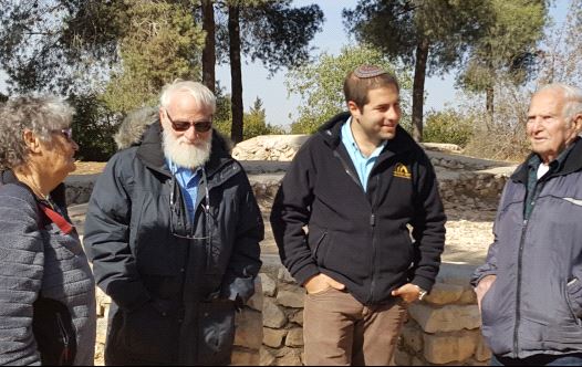 On Ammunition Hill, (from right to left) are Nir Nitzan, who led the charge into the Western Ammunition Hill trench in 1967, Yoram Taharlev, who wrote a famous Hebrew song about Ammunition Hill, JNF's Ammunition Hill Liaison Yoel Rosby and Nitzan's wife, Galia.  (credit: AMMUNITION HILL)