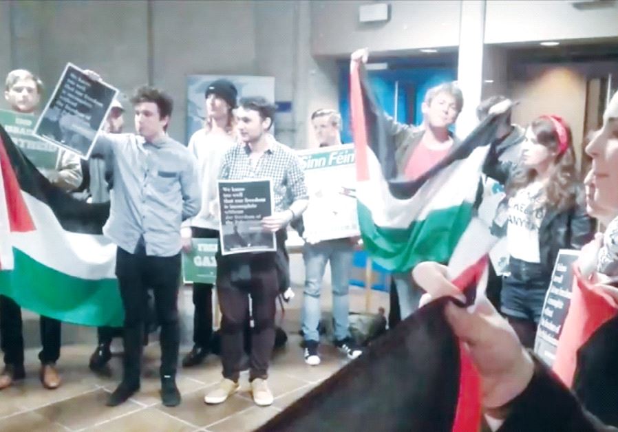 MEMBERS OF Students for a Just Palestine protest a scheduled lecture by Ambassador to Ireland Ze’ev Boker at Trinity College in Dublin, Ireland