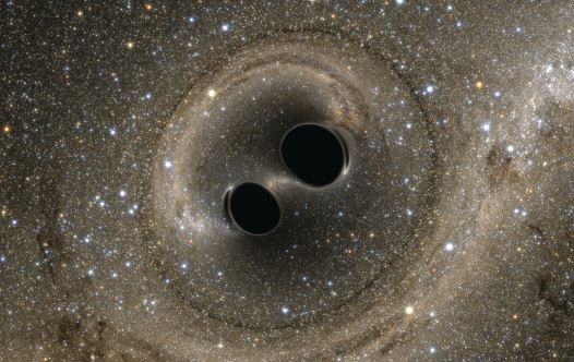 The collision of two black holes, a tremendously powerful event detected for the first time ever by the Laser Interferometer Gravitational-Wave Observatory (LIGO), is seen in this still image from a computer simulation released in February last year (credit: REUTERS)