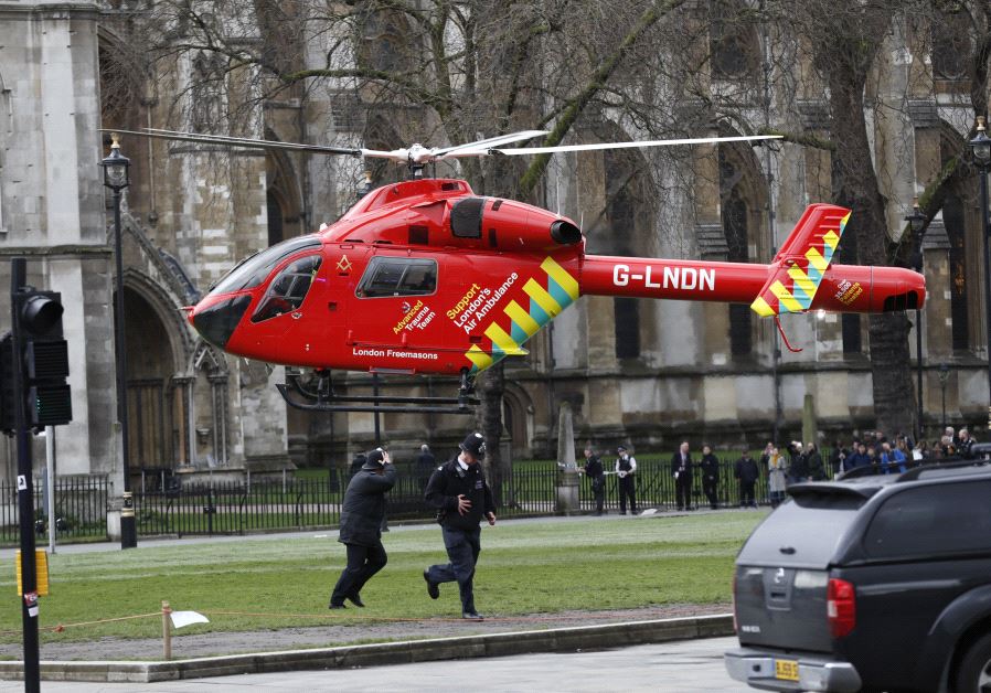 An air ambulance lands in Parliament Square during an incident on Westminster Bridge in London, Britain March 22, 2017. (Reuters)