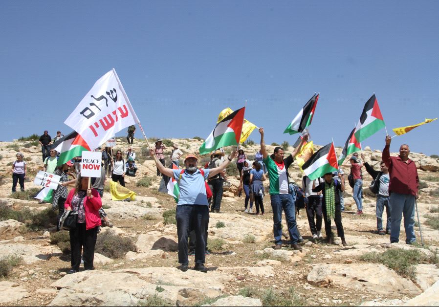 Peace Now demonstration outside of the Kochav HaShahar settlement in the West Bank. (credit: TOVAH LAZAROFF)