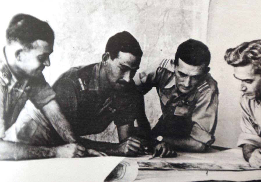 Harold ‘Smoky’ Simon (second left, inset) goes over plans with then-Israel Air Force commander Aharon Remez (left) and two unidentified serviceman during the War of Independence. (credit: Courtesy)
