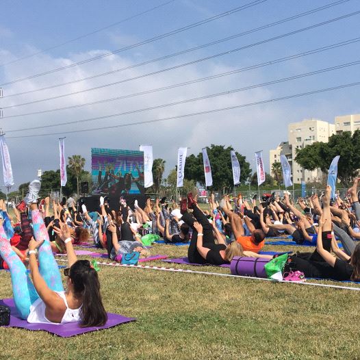 Israeli fitness buffs gather in Tel Aviv to hold the biggest Pilates class ever in Israel (credit: Lahav Harkov)