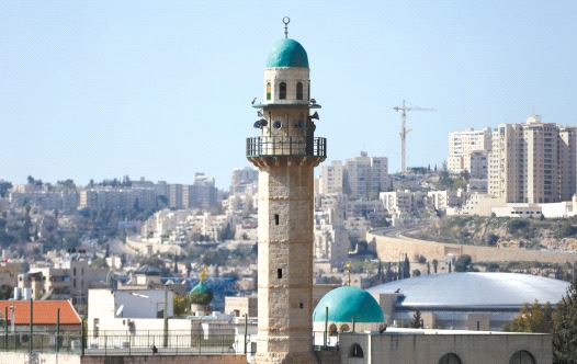 THE MINARET of a mosque is seen in the Arab neighborhood of Beit Safafa in Jerusalem (credit: REUTERS)