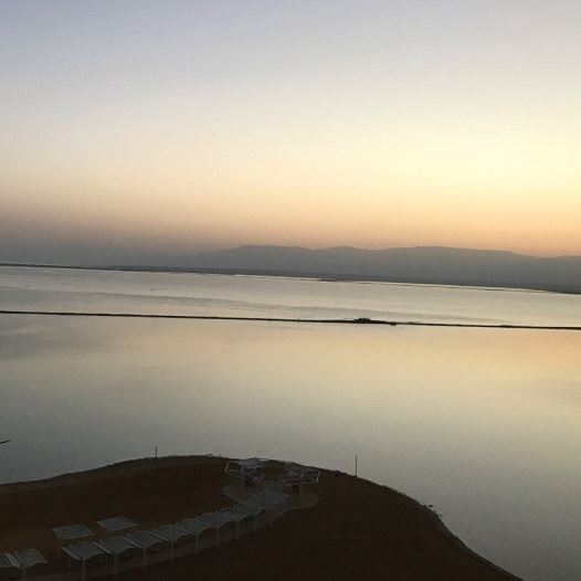 A view of the Dead Sea and Ein Bokek promenade at sunrise (credit: SETH J. FRANTZMAN)