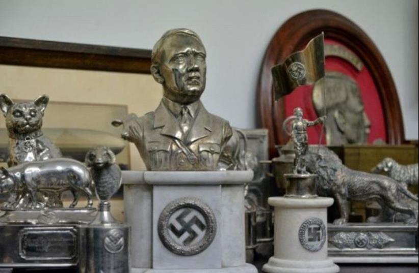 A bust of dictator Adolf Hitler, among other Nazi artifacts seized in the house of an art collector, is on display in Buenos Aires, in this undated handout released on June 20, 2017.  (photo credit: ARGENTINE MINISTRY OF SECURITY/HANDOUT VIA REUTERS)