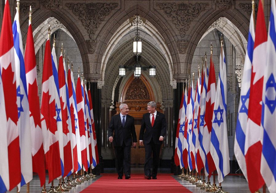 Canada's Prime Minister Stephen Harper (R) walks down the Hall of Honour with Israel's Prime Minister Benjamin Netanyahu on Parliament Hill in Ottawa March 2, 2012. (Reuters)