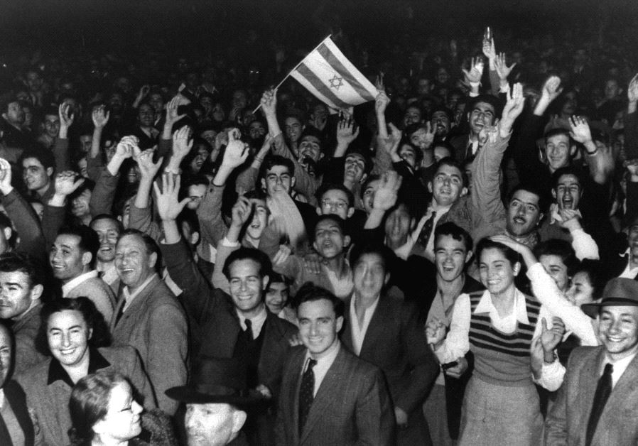 Jews celebrate in the streets of Tel Aviv moments after the United Nations voted on November 29, 1947, to partition Palestine which paved the way for the creation of the State of Israel on May 15, 1948.