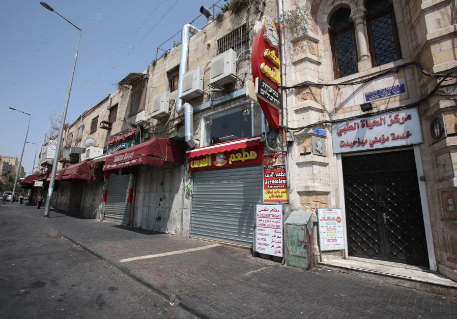 Empty shops on Sultan Suliman Street, Jerusalem, July 21, 2017. (Marc Israel Sellem)