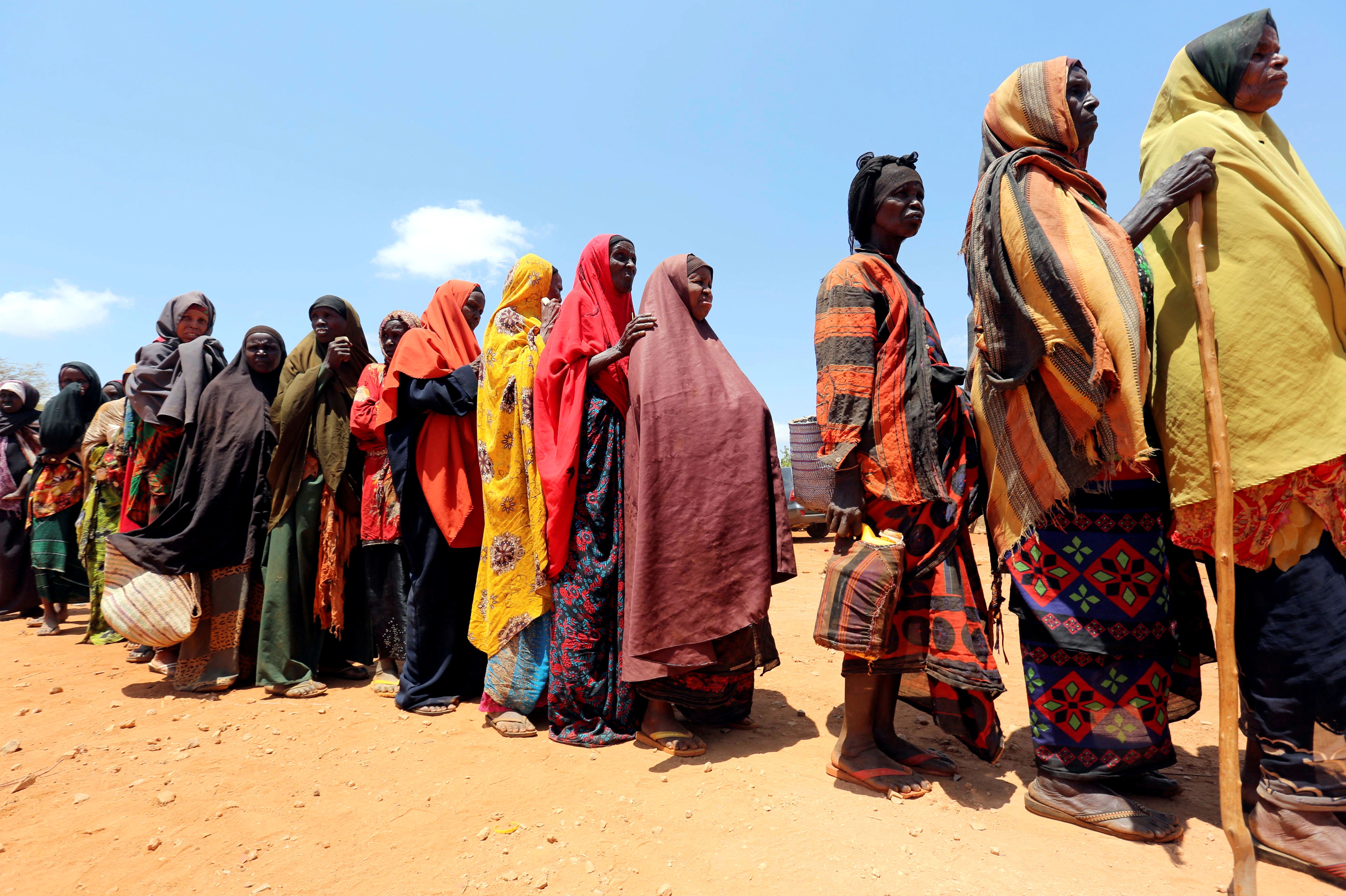 Internally displaced Somali women queue for relief food at a distribution centre organized by a Qatar charity after fleeing from drought stricken regions in Baidoa, west of Somalia's capital Mogadishu, April 9, 2017 (credit: REUTERS)