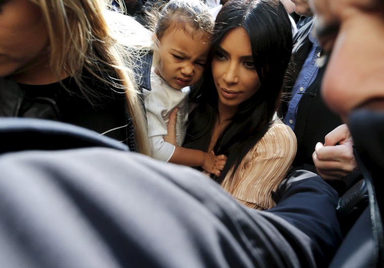 Kim Kardashian and daughter North West arrive for a baptism ceremony at the Cathedral of Saint James in Jerusalem's Old City