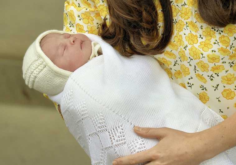 Britain's Catherine, Duchess of Cambridge, holds her baby daughter, May 2, 2015