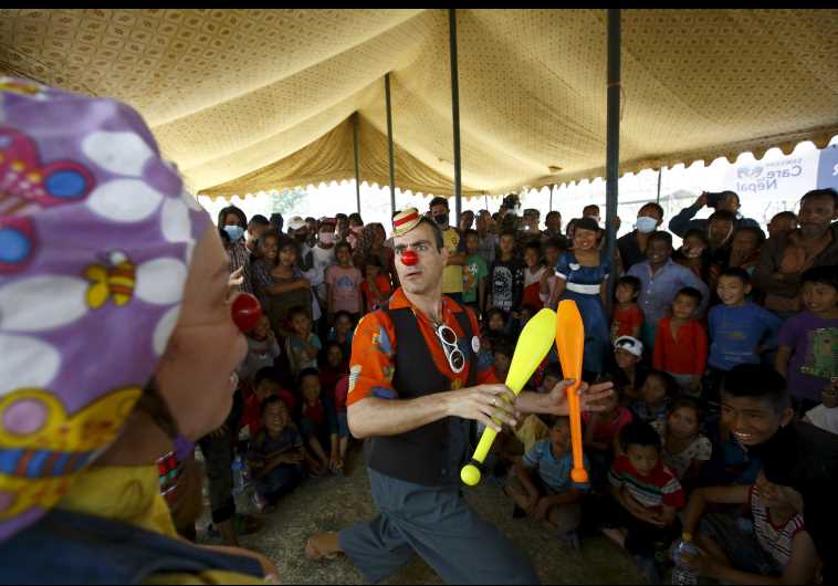 Medical clowns perform in front of children affected by earthquake in Kathmandu.