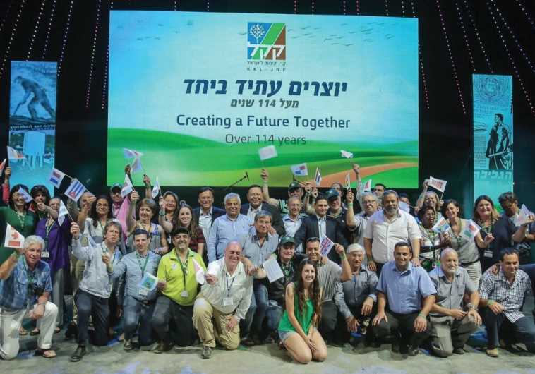Efi Stenzler poses with a group of delegation leaders on a solidarity mission from some 40 countries around the world