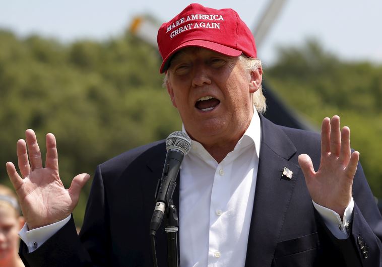 US Republican presidential candidate Donald Trump speaks to the media before heading over the Iowa State Fair in Des Moines, Iowa, United States, August 15, 2015. 