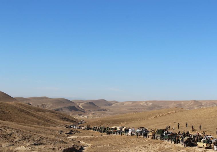 PESHMERGA forces, bolstered by armoured vehicles and thousands of volunteers from across the Kurdistan Regional Governate, as well as Yazidi fighters, gathered along road before final push into Shingal.