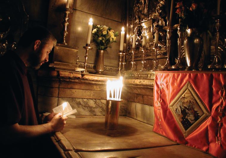 Praying at Jesus’s tomb, the oldest and most important section of the Church of the Holy Sepulchre