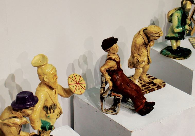 Ceramic figurines depict old hassidic figures as well as turn-of-the-century artisans