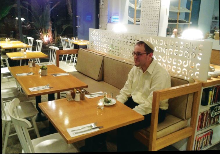 Chananya Weissman in Jerusalem’s Bagel Cafe