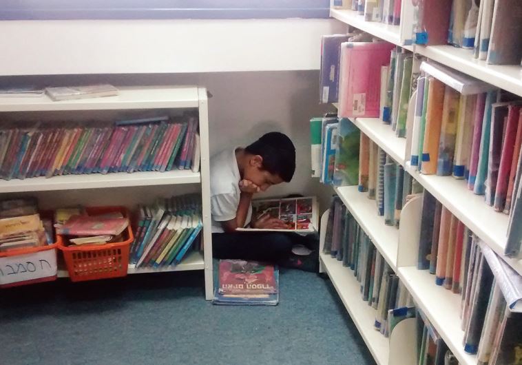 Local kids – and some parents – enjoy the Benjamin Children’s Library in Beit Shemesh