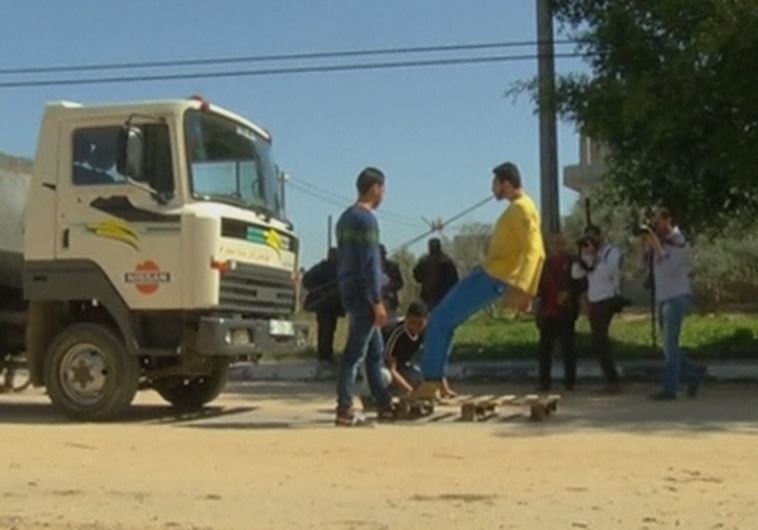 Twenty-year old Gazan strongman Mohamed Baraka wows crowds in Gaza with his strength