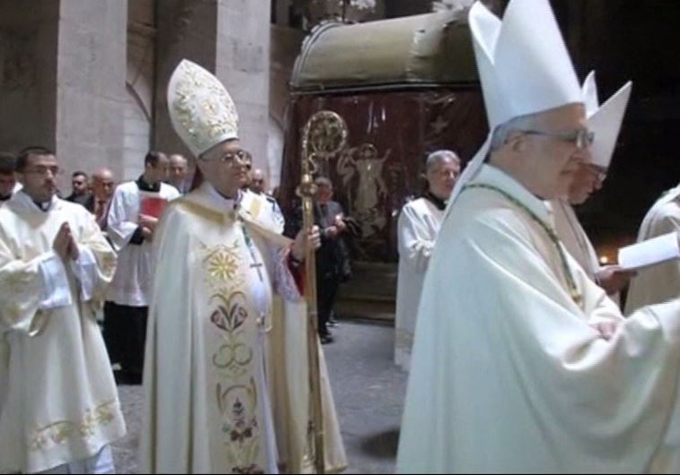 Christians attend Easter mass in Jerusalem's Holy Sepulchre