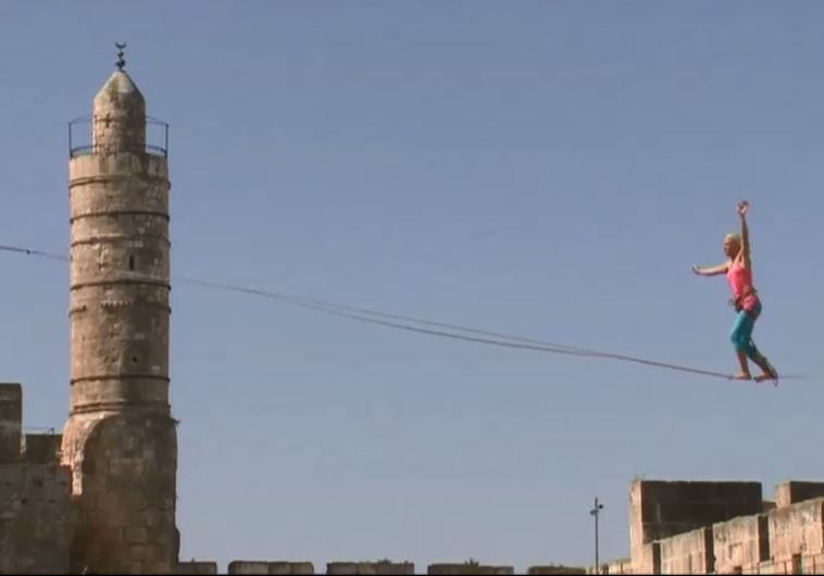 American highliner walks a narrow line between Jerusalem's ancient towers
