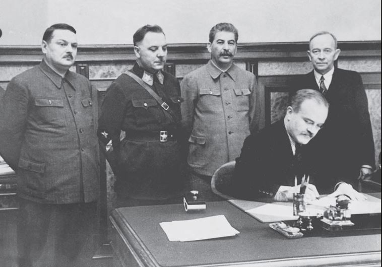 The Soviet leadership with (standing at left) Central Committee secretary Andrei Zhdanov. (Leader Joseph Stalin is standing second from right.)