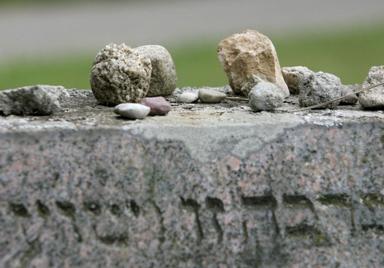 Stones lie on a tombstone in a Jewish cemetery in Vilnius August 7, 2007