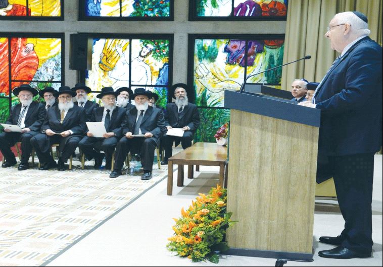 PRESIDENT REUVEN RIVLIN addresses the new members of the Supreme Rabbinical Court yesterday during their investiture at the President’s Residence in Jerusalem.