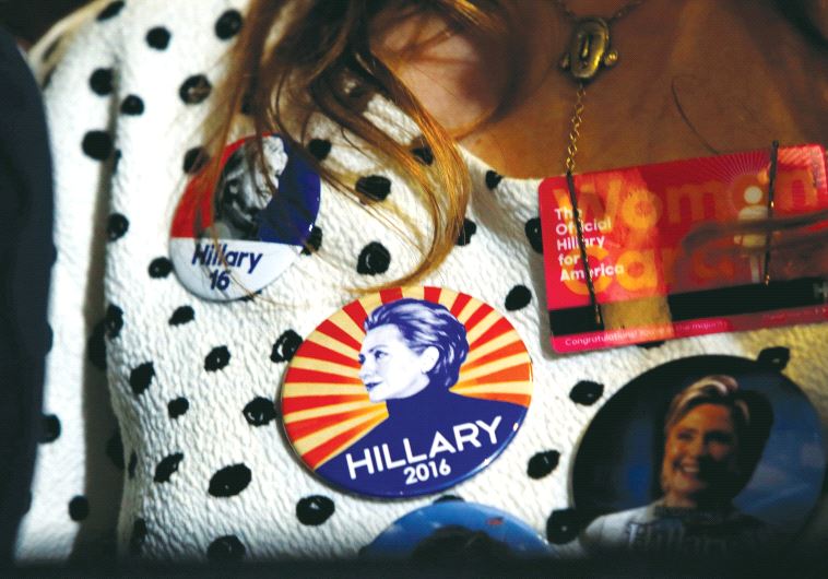 A SUPPORTER wears Democratic US presidential nominee Hillary Clinton buttons during a Clinton campaign rally in Las Vegas, Nevada, on August 4.