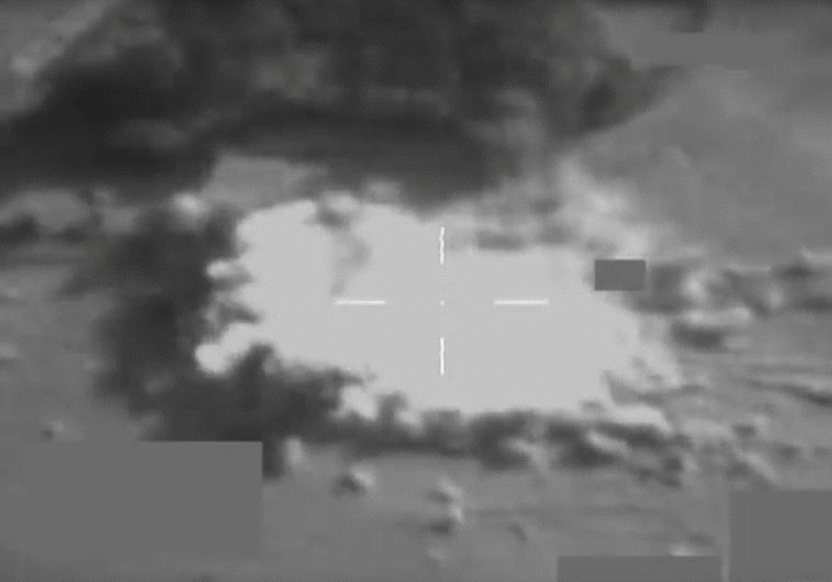 A still image taken from video released October 20, 2016 shows a British Royal Air Force Typhoon jet using a Paveway IV guided bomb to destroy a large IS truck-bomb south of Mosul, Iraq, on October 17, 2016.