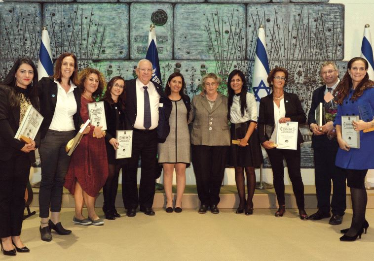 PRESIDENT REUVEN RIVLIN his wife, Nechama, flank Social Equality Minister Gila Gamliel yesterday at an event marking the International Day for the Elimination of Violence Against Women.